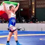 Pegulat asal Iran, Parviz Hadibasmanj, saat merayakan kemenangan nomor gaya bebas putra kelas 125 kg Asian Games 2018 di Jakarta, Senin (208). (Foto Fiqih Arfani)